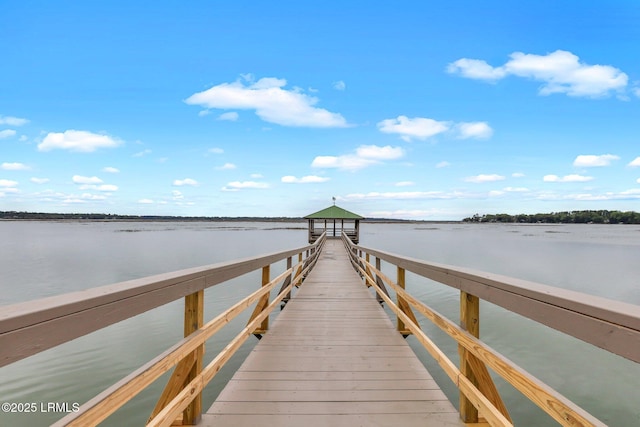 view of dock featuring a water view and a gazebo