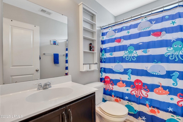 full bath featuring curtained shower, visible vents, vanity, and toilet