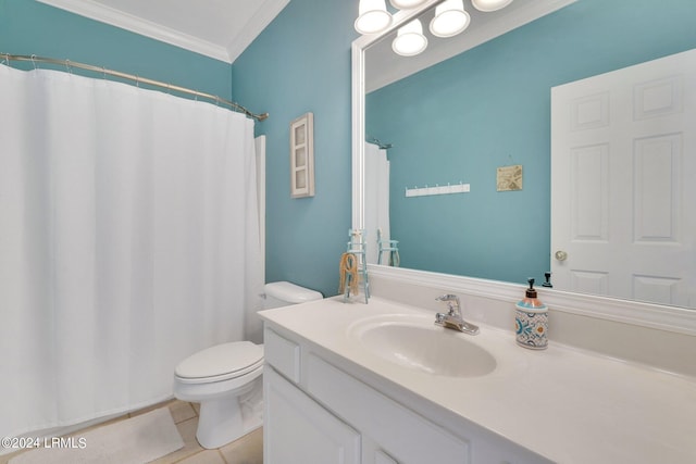 bathroom with vanity, ornamental molding, tile patterned floors, and toilet