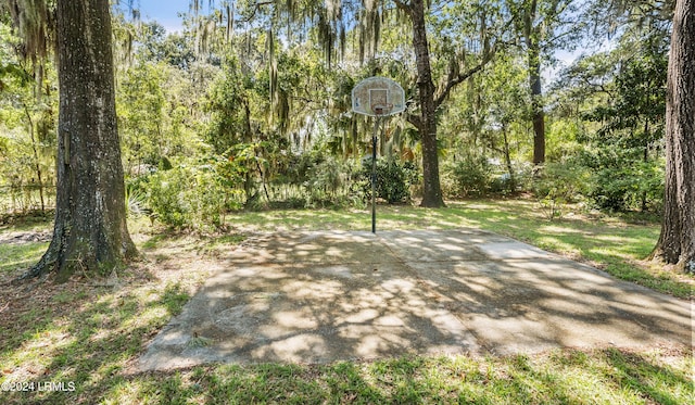 view of patio / terrace featuring basketball hoop