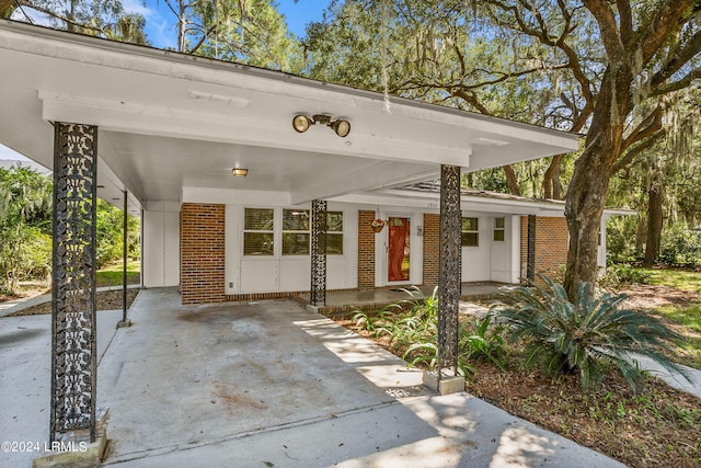 exterior space featuring a carport