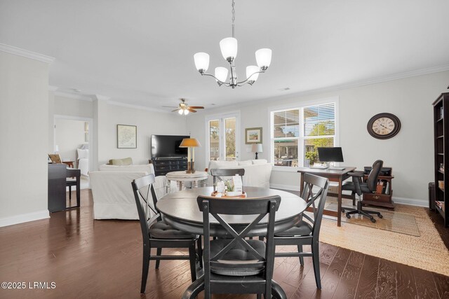 214 Lombards Mill Ln, Okatie, SC 29909 - dining room featuring ceiling fan with notable chandelier, ornamental molding, dark wood-type flooring, and baseboards