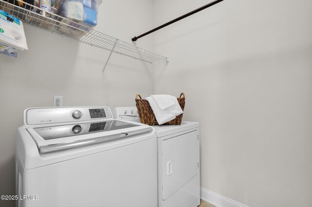 214 Lombards Mill Ln, Okatie, SC 29909 - laundry area with independent washer and dryer, laundry area, and baseboards