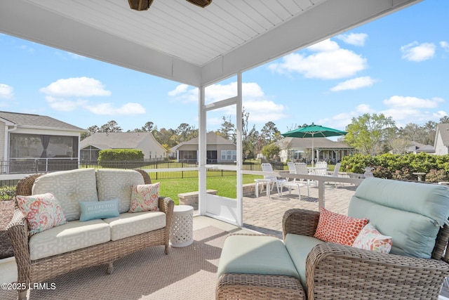 214 Lombards Mill Ln, Okatie, SC 29909 - view of patio with a residential view, fence, and outdoor lounge area