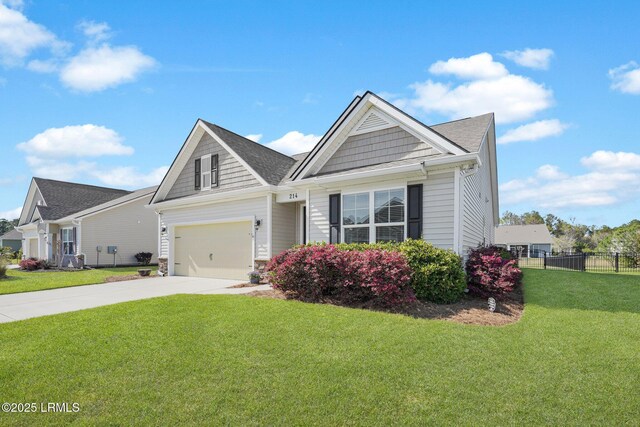 214 Lombards Mill Ln, Okatie, SC 29909 - view of front of home featuring driveway, a front yard, and fence