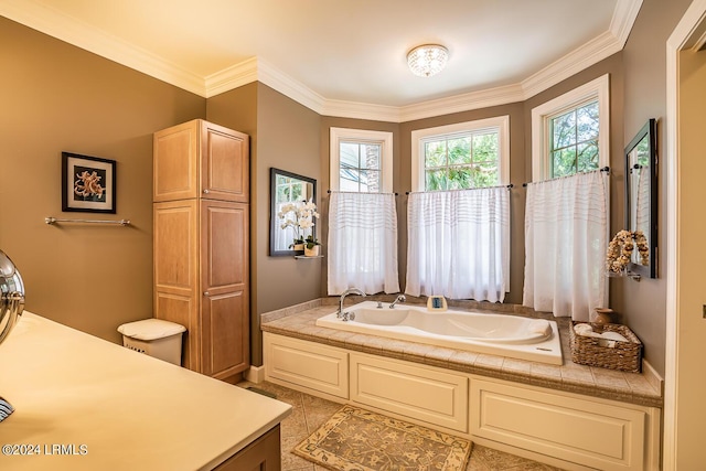 bathroom featuring a bath, crown molding, and tile patterned floors