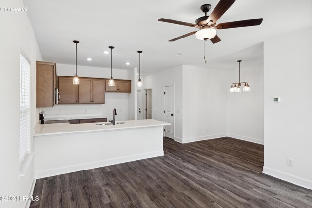 47 Silver St Unit 102, Ridgeland, SC 29936 - kitchen with a peninsula, a sink, light countertops, range, and dark wood finished floors