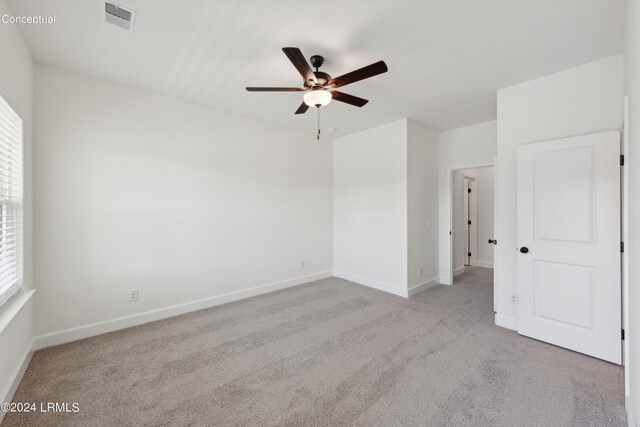 47 Silver St Unit 102, Ridgeland, SC 29936 - carpeted spare room with visible vents, ceiling fan, and baseboards