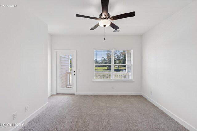 47 Silver St Unit 102, Ridgeland, SC 29936 - spare room with a ceiling fan, carpet flooring, visible vents, and baseboards
