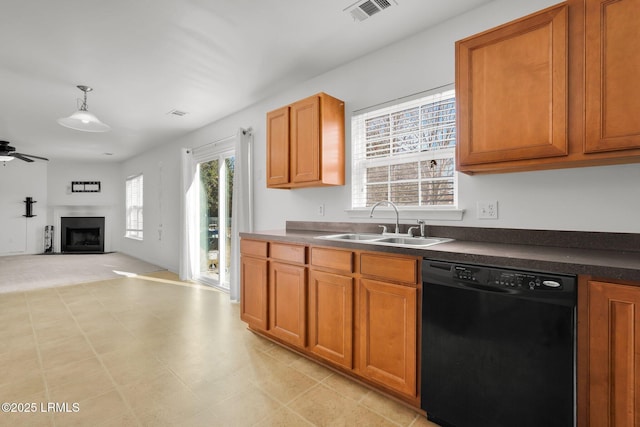 kitchen featuring sink, decorative light fixtures, dishwasher, and ceiling fan