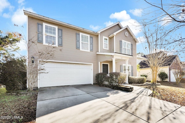 view of front of property featuring a garage