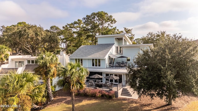 rear view of property with a patio area