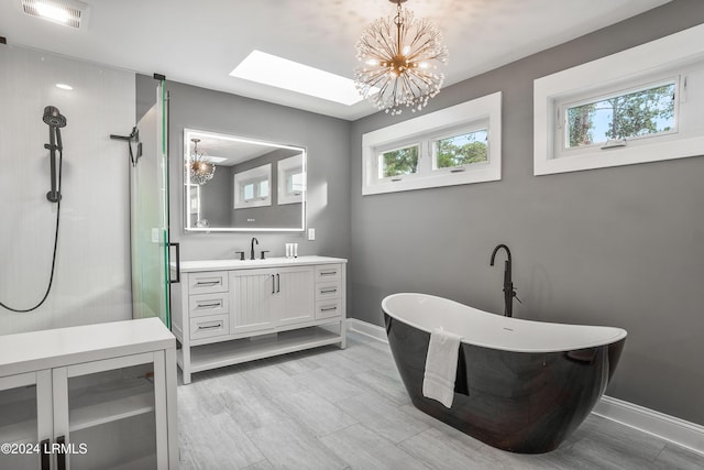 bathroom featuring vanity, shower with separate bathtub, a healthy amount of sunlight, and wine cooler