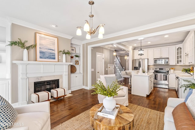 living area featuring a fireplace, dark wood finished floors, and crown molding