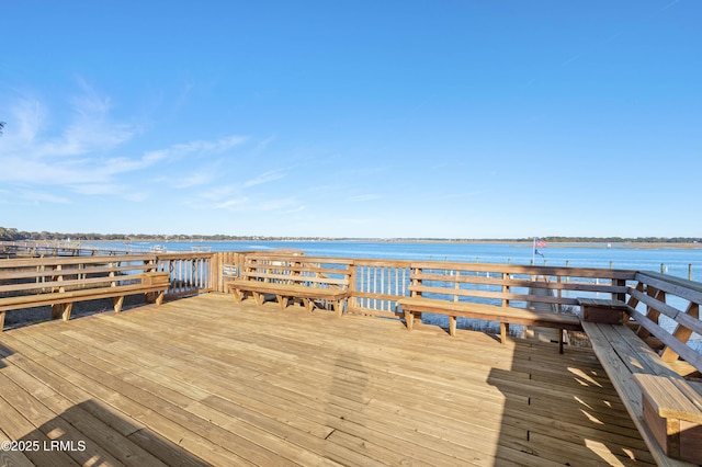 dock area with a deck with water view