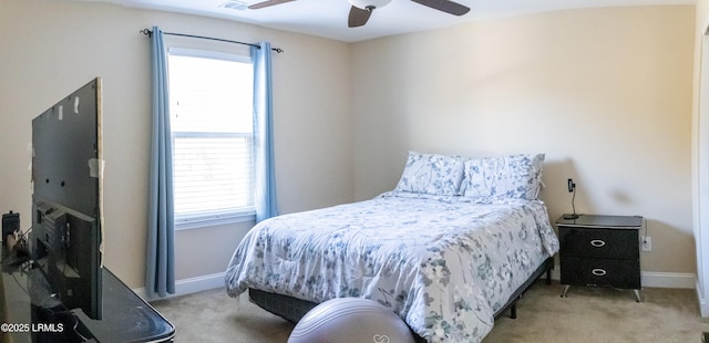 bedroom with light colored carpet and ceiling fan