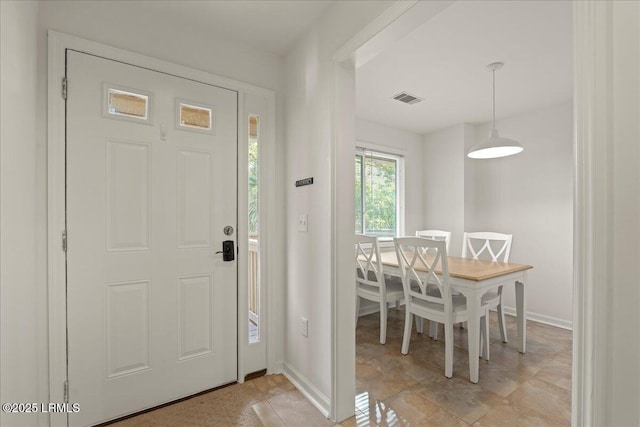 entrance foyer with visible vents and baseboards