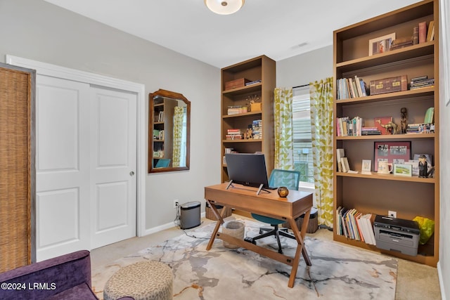 office area with light carpet