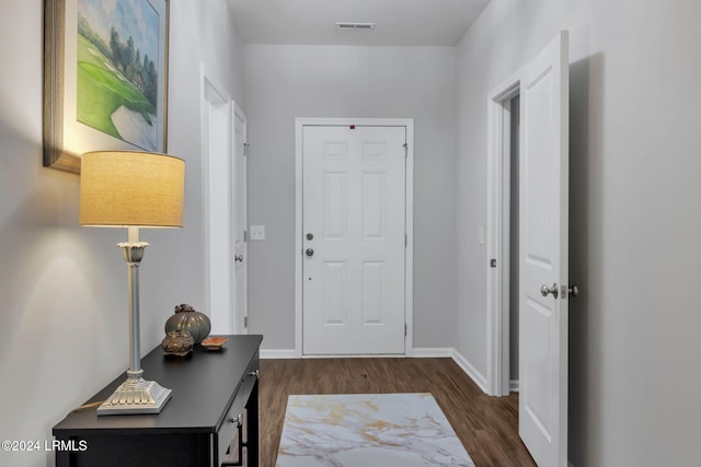 interior space with dark hardwood / wood-style flooring