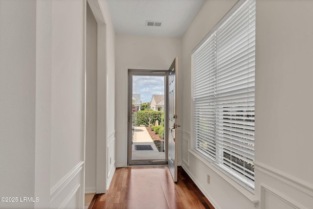 34 Basket Walk Dr, Okatie, SC 29909 - doorway to outside featuring visible vents and wood finished floors