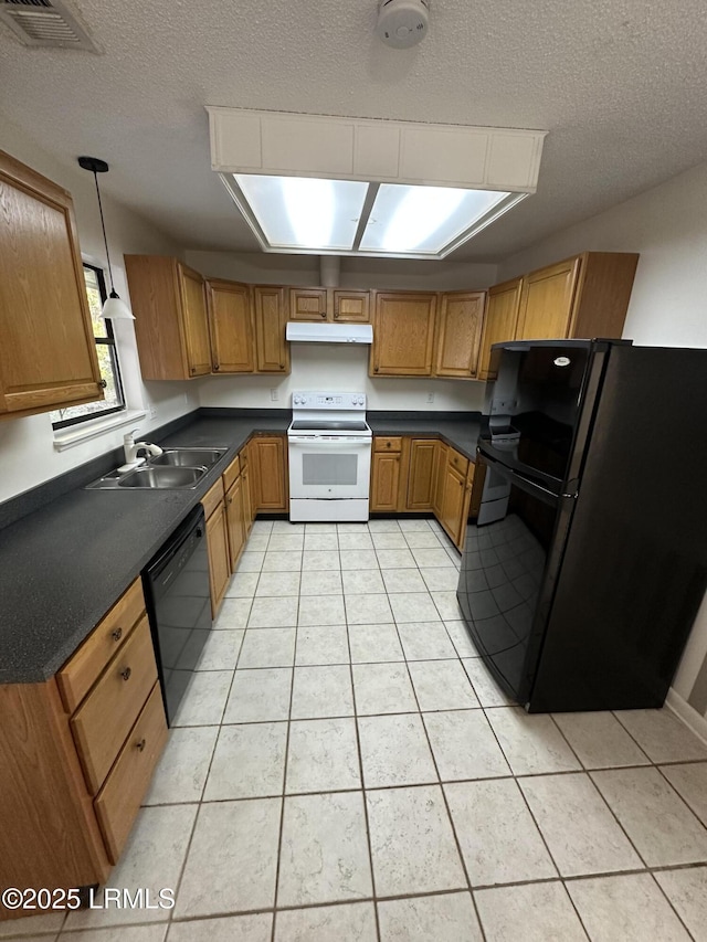 kitchen featuring pendant lighting, sink, light tile patterned floors, black appliances, and a textured ceiling