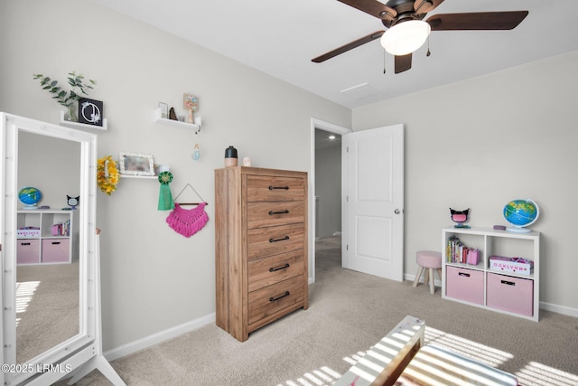 bedroom with carpet flooring, a ceiling fan, and baseboards