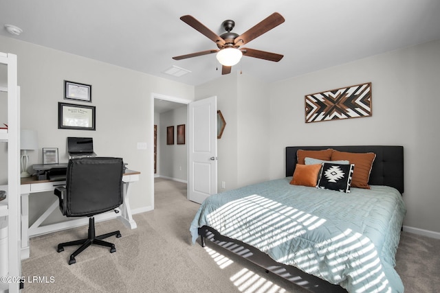 bedroom featuring a ceiling fan, visible vents, baseboards, and carpet flooring