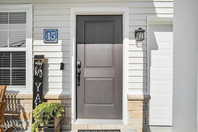 entrance to property with a garage