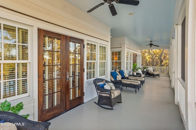 view of patio / terrace with french doors, ceiling fan, and covered porch