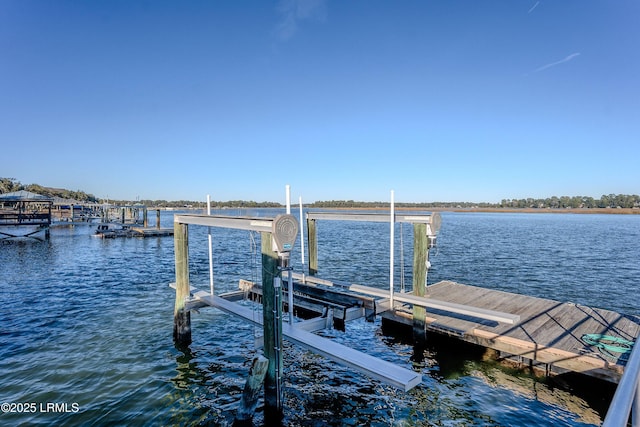 view of dock with a water view