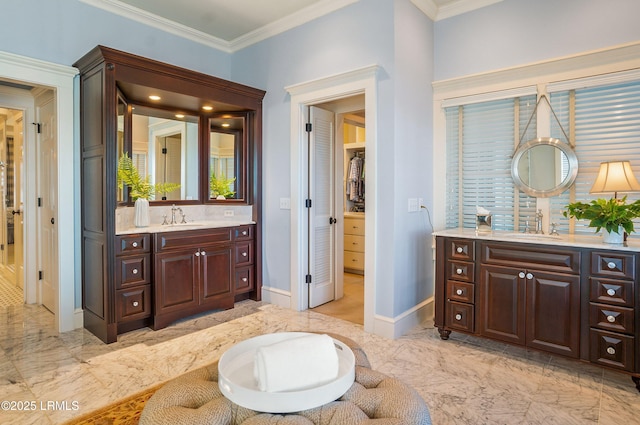 bathroom featuring vanity and ornamental molding