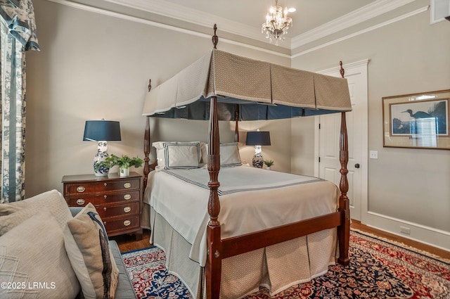 bedroom featuring crown molding, wood-type flooring, and a notable chandelier