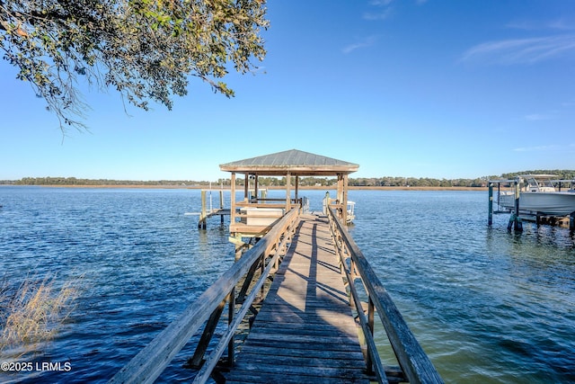 dock area featuring a water view