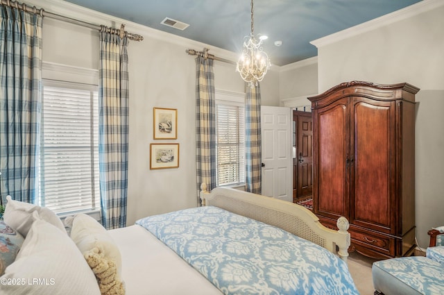 bedroom featuring an inviting chandelier, ornamental molding, and carpet flooring