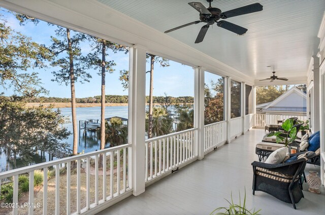 sunroom with a water view