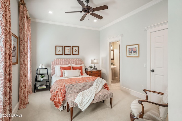 carpeted bedroom featuring connected bathroom, crown molding, and ceiling fan