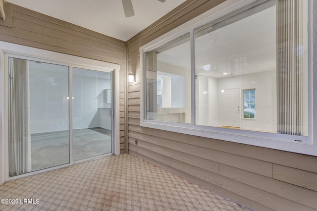 view of patio featuring ceiling fan