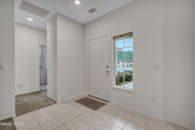 view of tiled foyer entrance