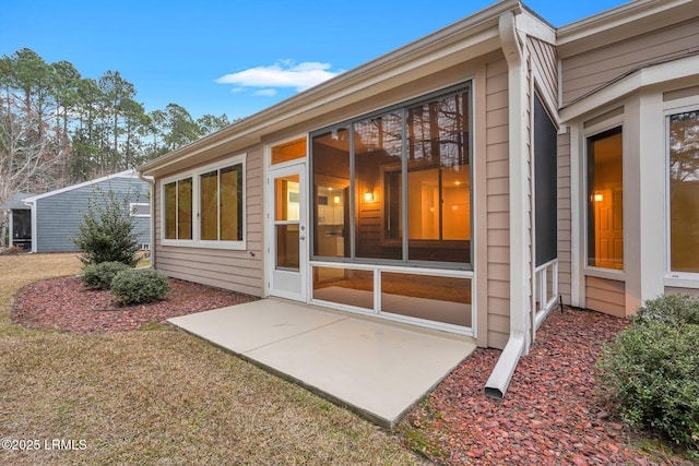 rear view of property with a patio area