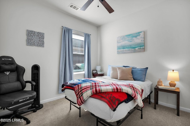 bedroom with light colored carpet and ceiling fan