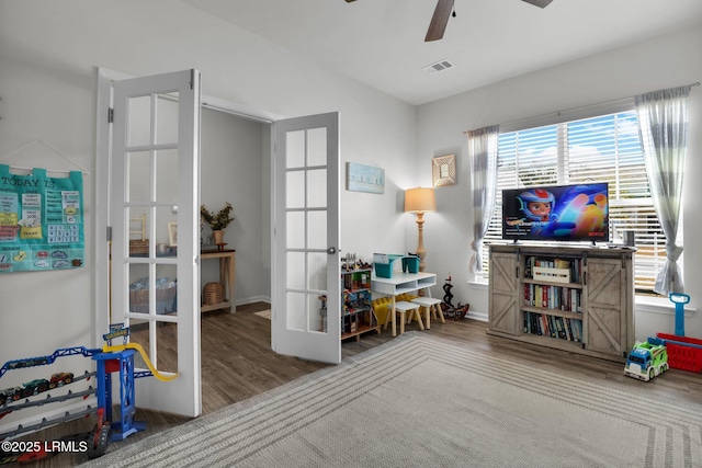 interior space featuring french doors, ceiling fan, and hardwood / wood-style floors