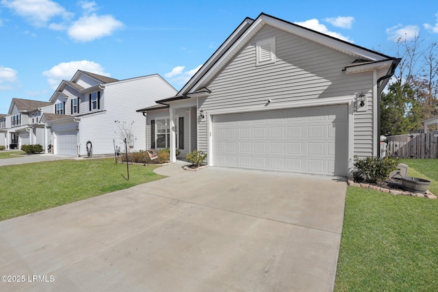 view of front facade with a garage and a front yard