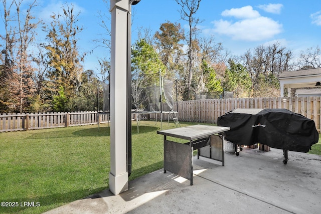 view of patio featuring grilling area and a trampoline