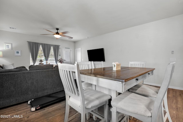 dining area with ceiling fan and light wood-type flooring