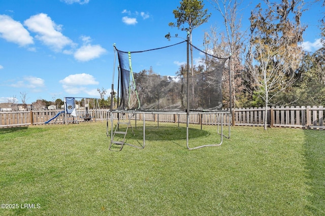 view of yard with a playground