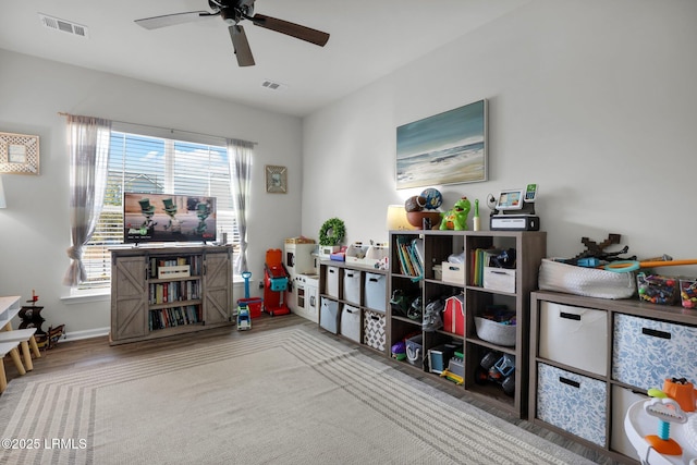 game room with ceiling fan