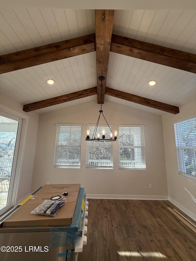 unfurnished dining area with an inviting chandelier, dark wood-type flooring, and lofted ceiling with beams