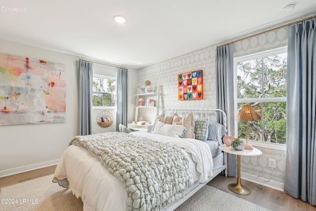 bedroom featuring wood-type flooring