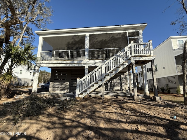 view of front facade with a sunroom