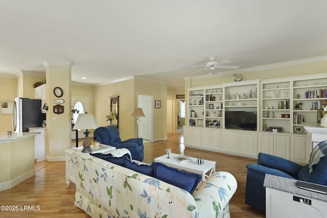11 Argent Way, Bluffton, SC 29909 - living area with ceiling fan, crown molding, light wood finished floors, and baseboards